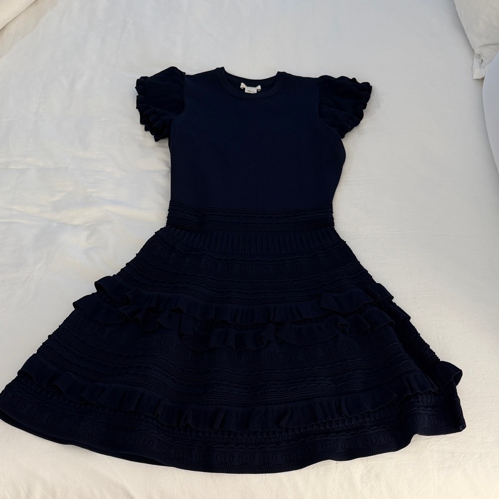 Shoshanna knit navy dress with ruffle detail. Never worn!